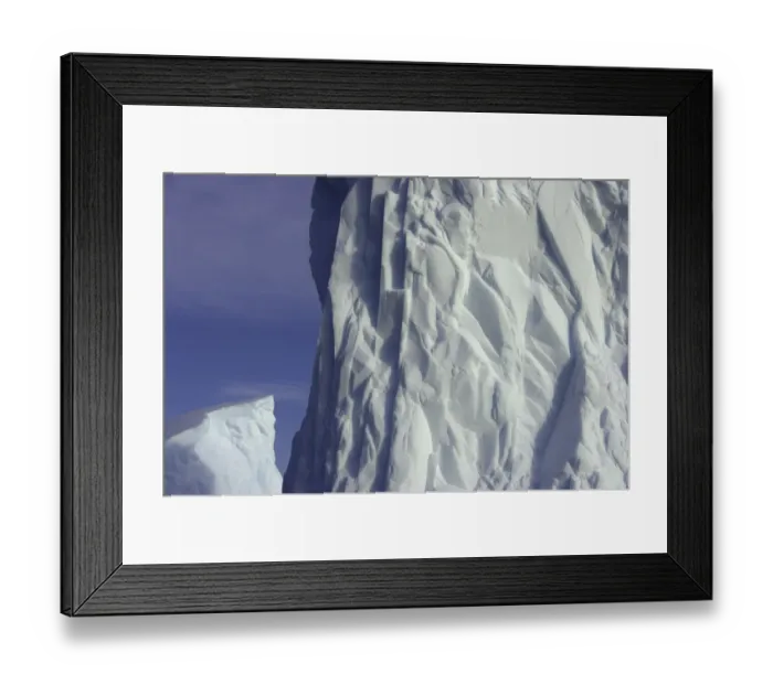 Framed Print : Blue iceberg floating in sea in spring