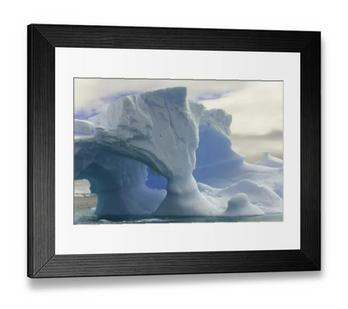 Framed Print : iceberg with arches, Antarctic Peninsula