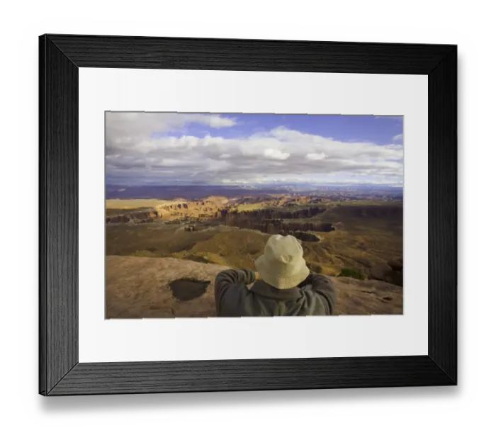 Framed Print : USA, Utah, Canyonlands National Park, man above canyon, rear view Framed Print : USA, Utah, Canyonlands National Park, man above canyon, rear view