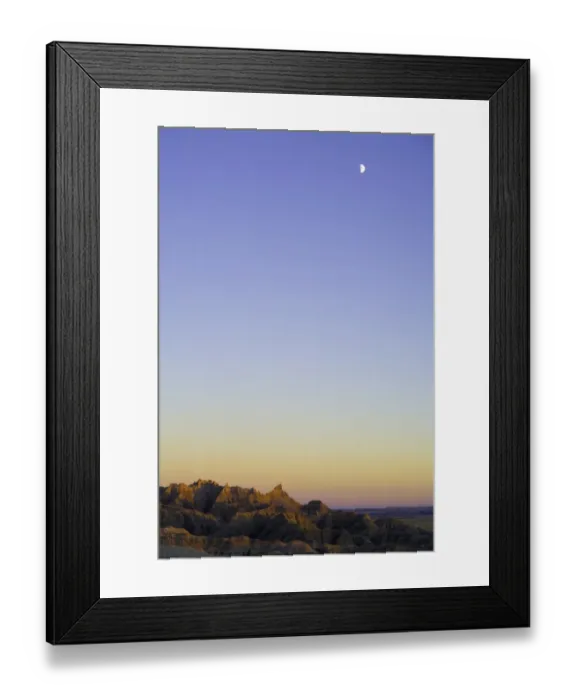Framed Print : USA, South Dakota, Badlands National Park, moon over sandstone buttes Framed Print : USA, South Dakota, Badlands National Park, moon over sandstone buttes