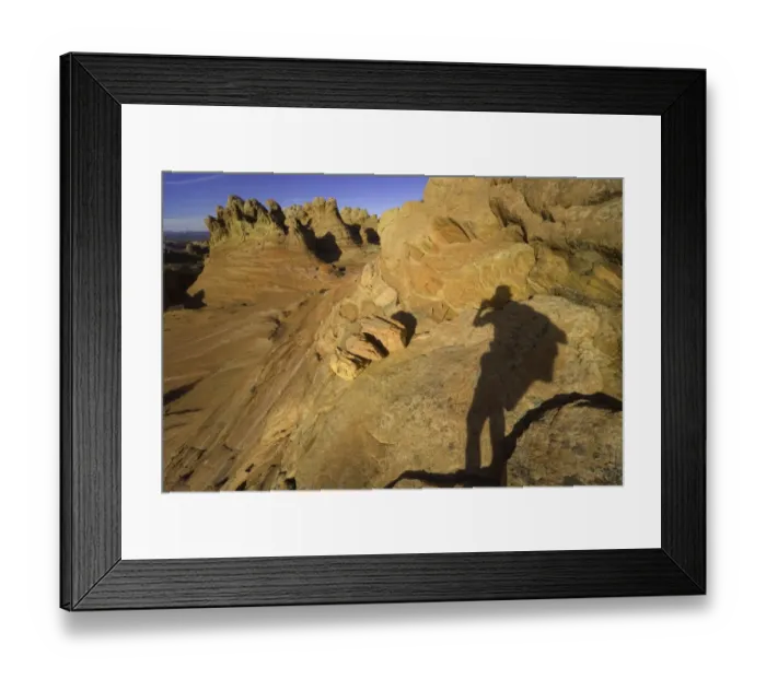 Framed Print : Shadow of man taking photograph of scenery Framed Print : Shadow of man taking photograph of scenery