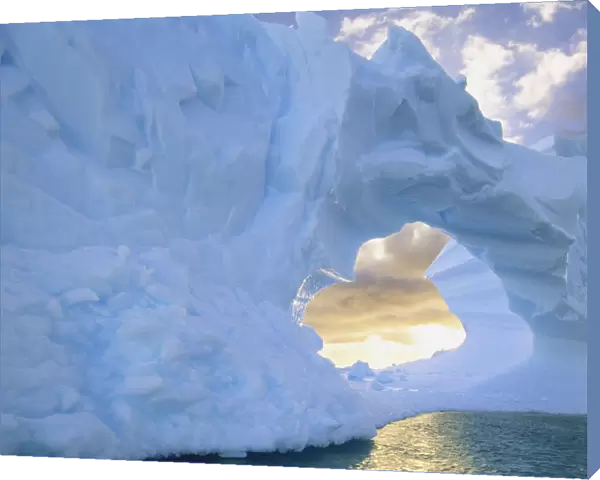 Antarctic Peninsula, Drake Passage, iceberg at sea, sunset