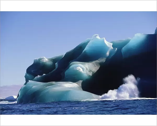 Antarctic Peninsula, Drake Passage, waves crashing against iceberg
