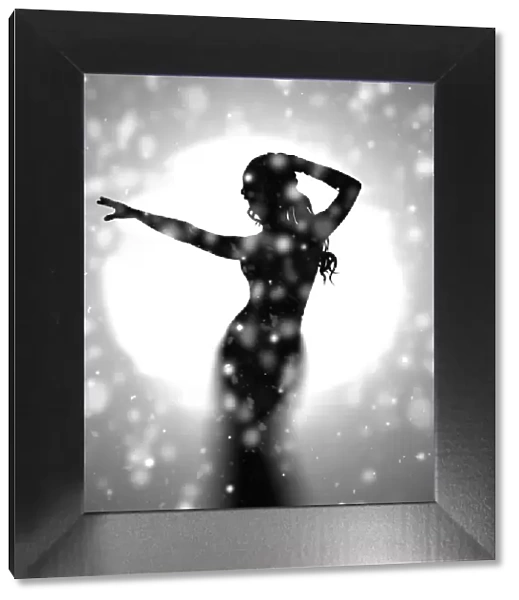Silhouette of sexy woman dancing