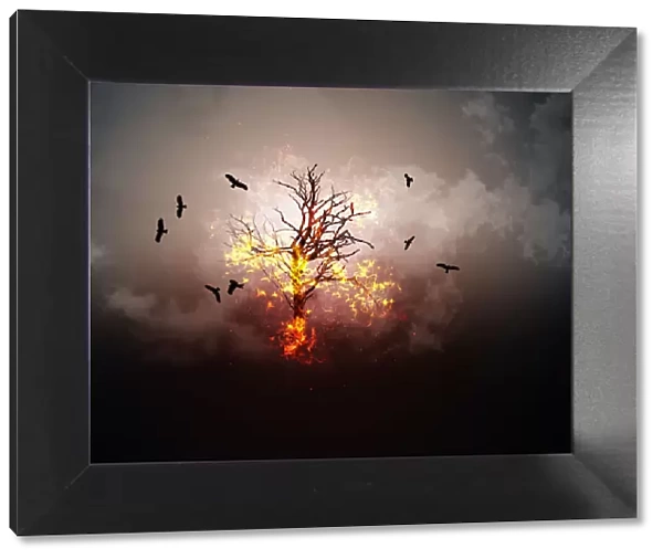 Creative burning tree with flying birds