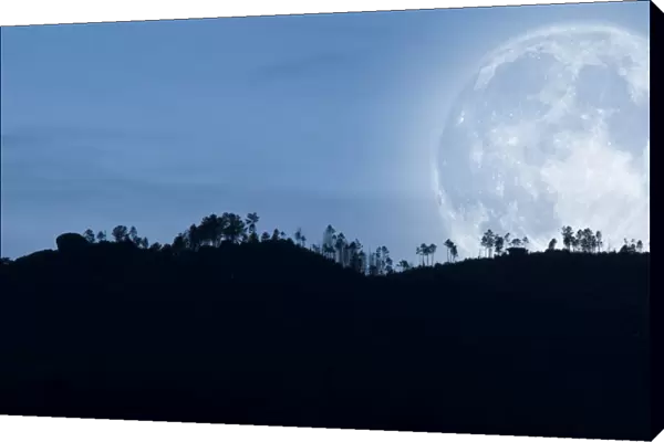 Full moon over the hills