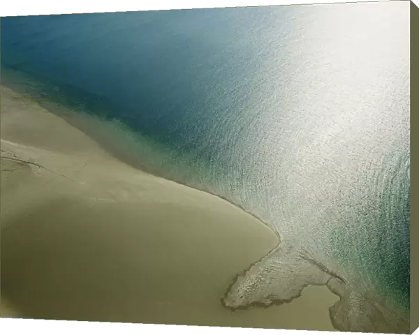 Empty beach and calm sea, aerial view