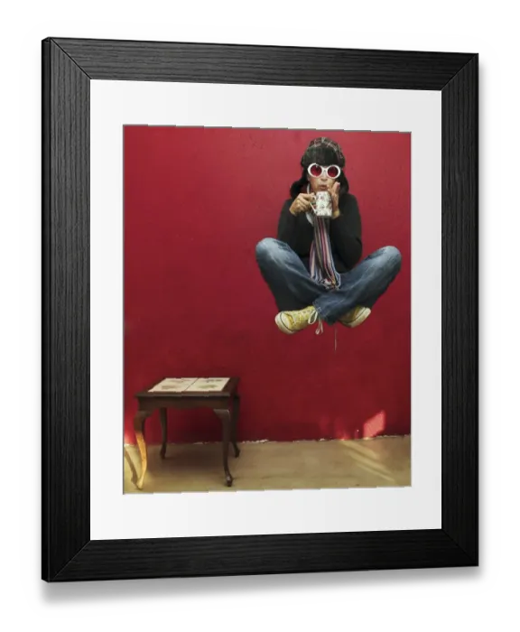 Framed Print : High Tea. A manipulated photo of someone sitting cross legged, floating and drinking tea Framed Print : High Tea. A manipulated photo of someone sitting cross legged, floating and drinking tea