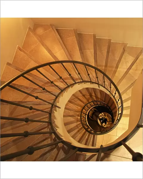 Staircase, haunting, mysterious, classy, dizzy