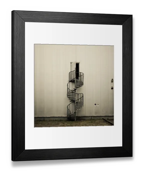 Framed Print : Spiral staircase with open door Framed Print : Spiral staircase with open door