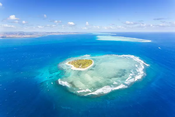 Aerial view of heart shaped island Tavarua, Fiji