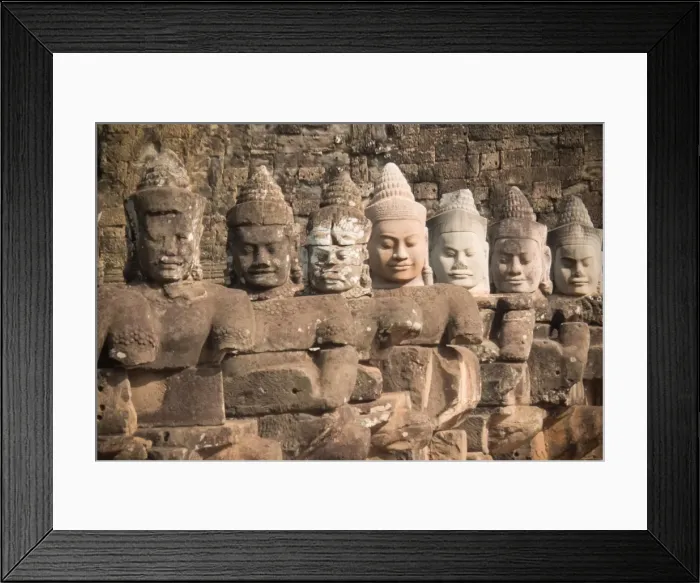 Framed Print : Stone angle statue on the way to bayon temple famous place near angkor wat in siemreap, cambodia