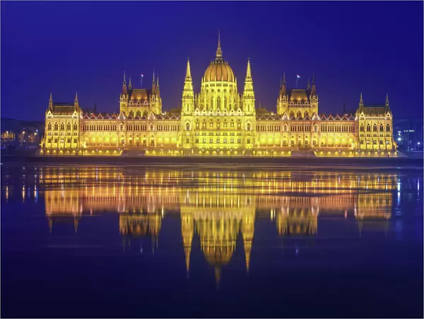 The Parliament of Hungary with the Danube river (Budapest, Hungary) in the night