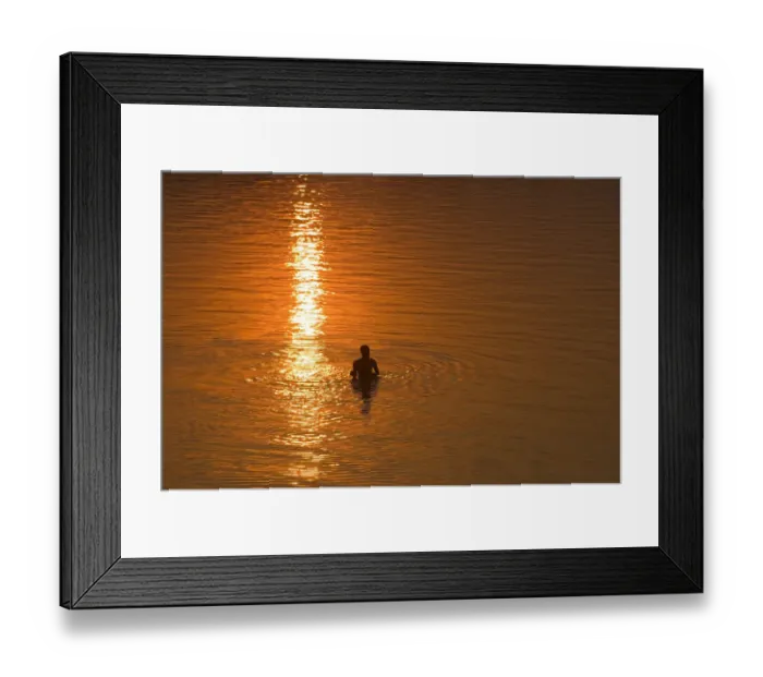 Framed Print : India, Goa, swimmer silhouetted in water, elevated veiw Framed Print : India, Goa, swimmer silhouetted in water, elevated veiw
