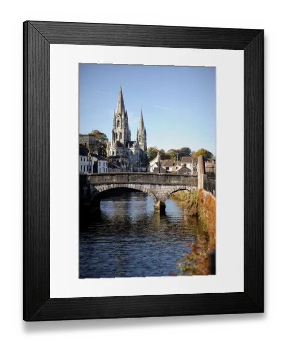 Framed Print : Cork City. A bridge across River Lee with St.Fin Barres Cathedral in the background Framed Print : Cork City. A bridge across River Lee with St.Fin Barres Cathedral in the background