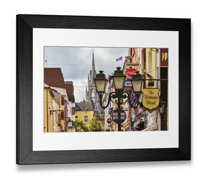 Framed Print : Signs and lights in a street scene in downtown Cork, with Holy Trinity Church in the background, Ireland Framed Print : Signs and lights in a street scene in downtown Cork, with Holy Trinity Church in the background, Ireland
