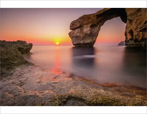 The Azure Window natural arch at sunset