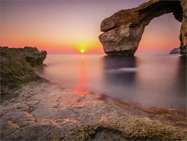 The Azure Window natural arch at sunset