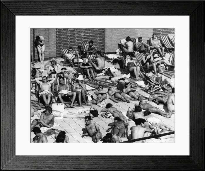 Framed Print : Heatwave. A crowd of sunbathers at the Oasis open-air swimming pool Framed Print : Heatwave. A crowd of sunbathers at the Oasis open-air swimming pool