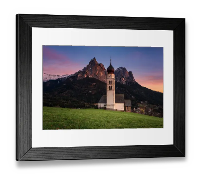 Framed Print : Sunset scenery of Church St. Valentin at Kastelruthand jagged rocks of Schlern background Framed Print : Sunset scenery of Church St. Valentin at Kastelruthand jagged rocks of Schlern background