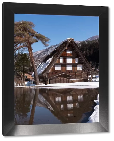 The reflection of traditional house in Shirakawa-go village, Japan