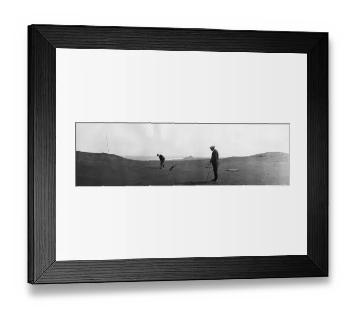 Framed Print : Golfers. April 1901: Two men play golf at Bamburgh Castle, Northumberland Framed Print : Golfers. April 1901: Two men play golf at Bamburgh Castle, Northumberland