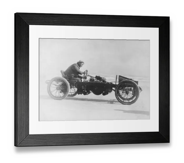 Framed Print : Man driving vintage race car (B&W) Framed Print : Man driving vintage race car (B&W)
