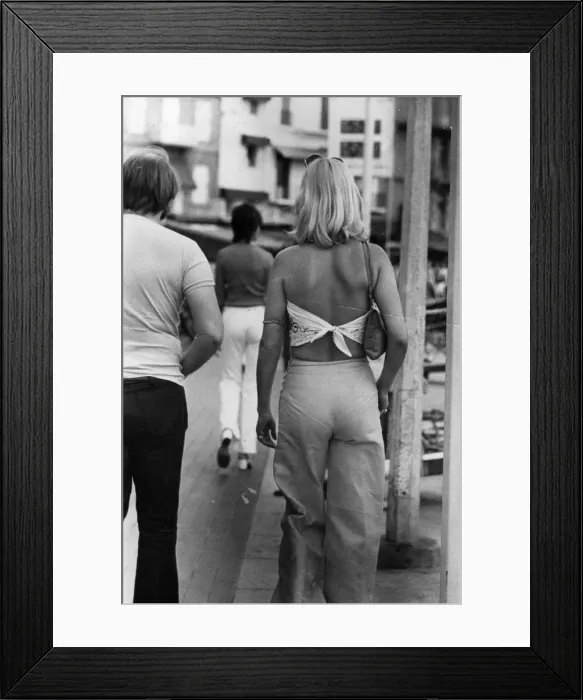 Framed Print : Scarf Top. A woman wearing a scarf tied to make a halterneck top in St Tropez Framed Print : Scarf Top. A woman wearing a scarf tied to make a halterneck top in St Tropez
