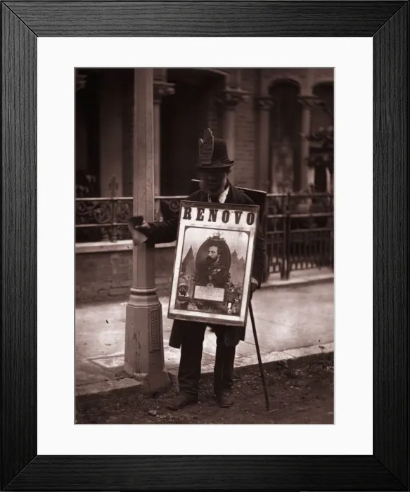 Framed Print : Board Man. A sandwich-board man on a street in London Framed Print : Board Man. A sandwich-board man on a street in London
