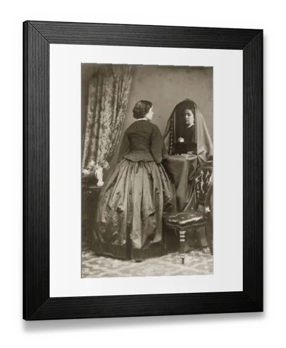 Framed Print : Not Bad. circa 1855: A woman in a short fitted jacket with a basque worn Framed Print : Not Bad. circa 1855: A woman in a short fitted jacket with a basque worn