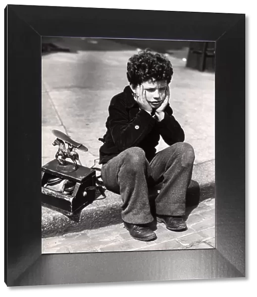 Sad Boy, Curly Hair Sitting On Curb Patched Trousers Shoeshine Kit Work Working Worker Shoe Shine Poor Poverty Depression Rrr Retro