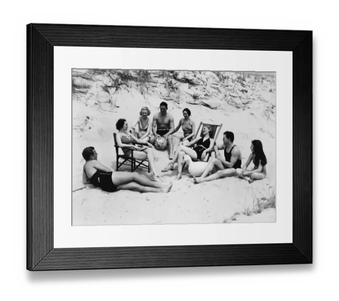 Framed Print : Woman wearing bathing suit, sitting by wall Framed Print : Woman wearing bathing suit, sitting by wall