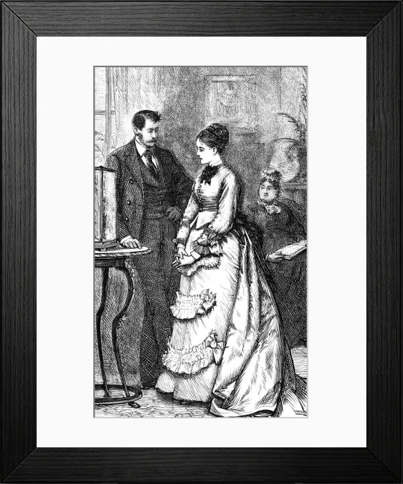 Framed Print : Couple talking at a round table in living room Framed Print : Couple talking at a round table in living room