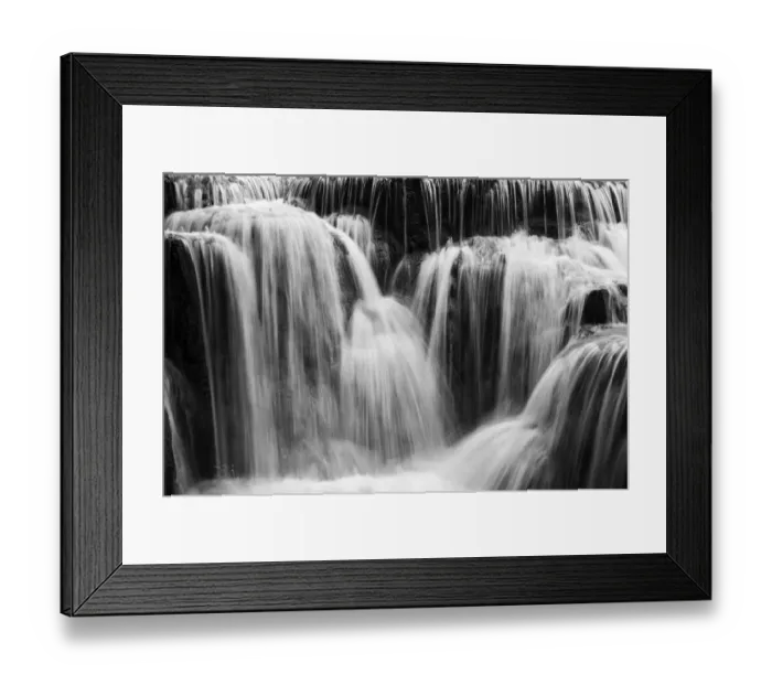 Framed Print : Full frame close-up of a cascade at the Tat Kuang Si Waterfalls near Luang Prabang in Laos. Natural abstract art in black and white Framed Print : Full frame close-up of a cascade at the Tat Kuang Si Waterfalls near Luang Prabang in Laos. Natural abstract art in black and white