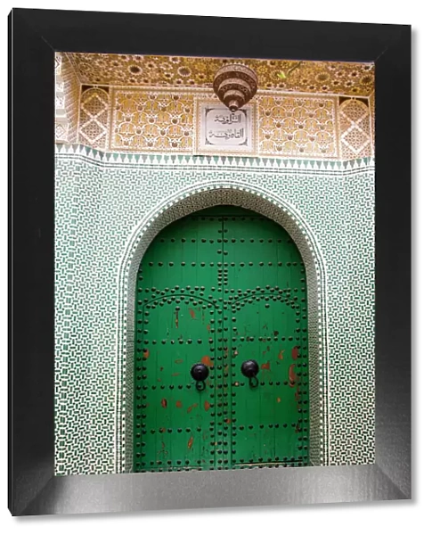 Entrance to a Moroccan house with a green door