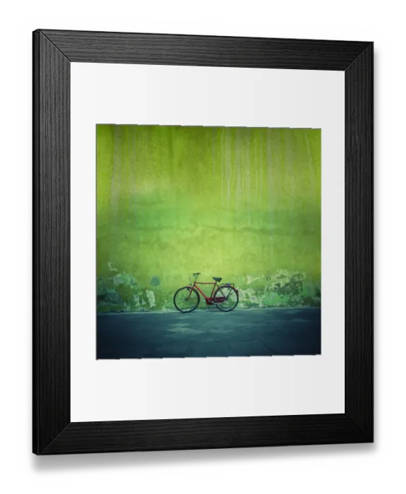 Framed Print : Red vintage bike against a green flaking plaster wall Framed Print : Red vintage bike against a green flaking plaster wall