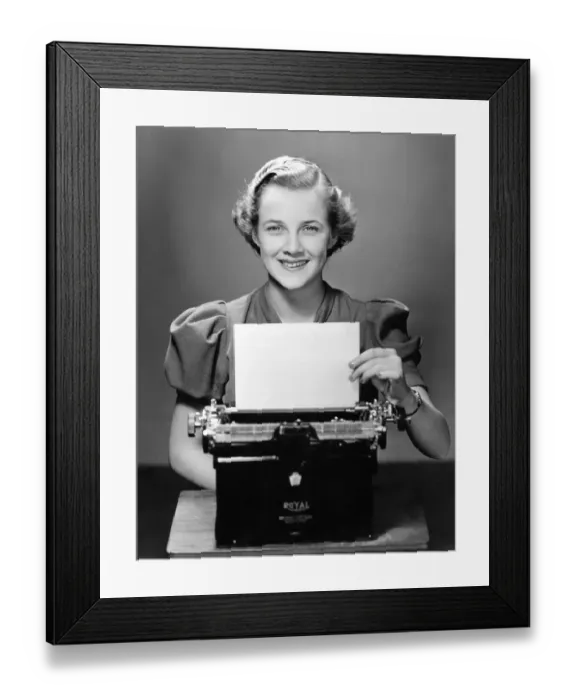 Framed Print : Business woman / secretary at typewriter Framed Print : Business woman / secretary at typewriter