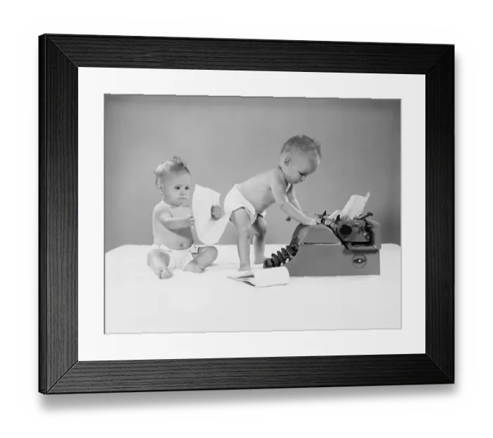 Framed Print : Baby standing at typewriter, twin seated behind looking at papers Framed Print : Baby standing at typewriter, twin seated behind looking at papers
