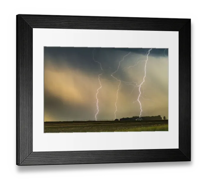 Framed Print : Multiple Lightning strikes hit a ranch in Nebraska at sunset, USA Framed Print : Multiple Lightning strikes hit a ranch in Nebraska at sunset, USA