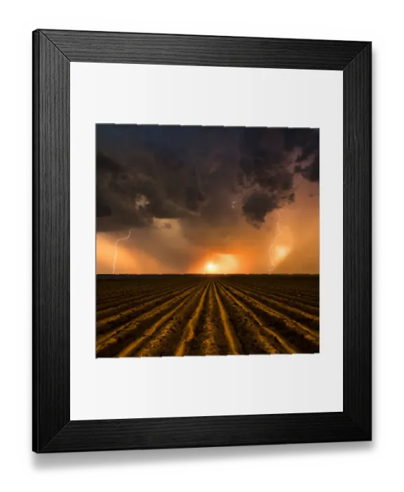 Framed Print : Sunset Thunderstorm over a ploughed field, Nebraska. USA Framed Print : Sunset Thunderstorm over a ploughed field, Nebraska. USA