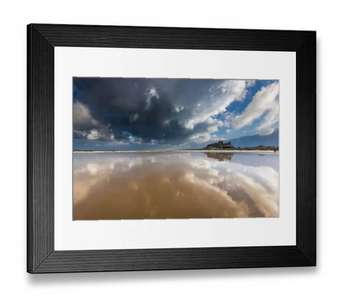 Framed Print : Bamburgh castle and beach reflections Framed Print : Bamburgh castle and beach reflections