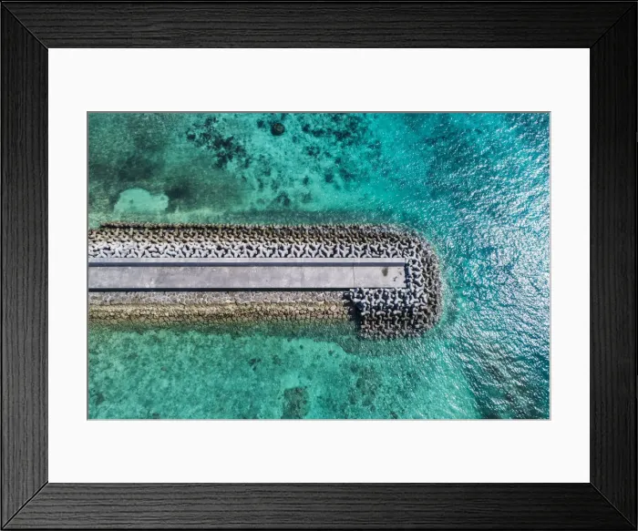 Framed Print : Aerial view Of blue sea and breakewater Framed Print : Aerial view Of blue sea and breakewater