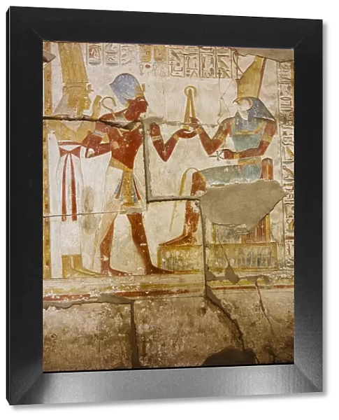 Polychromatic hieroglyphic showing The god Horus and Pharaoh Seti I at Abydos