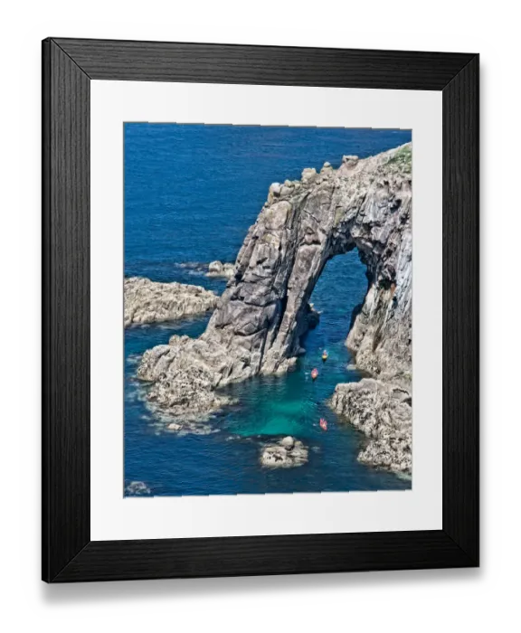 Framed Print : Canoeists at lands end, Cornwall Framed Print : Canoeists at lands end, Cornwall