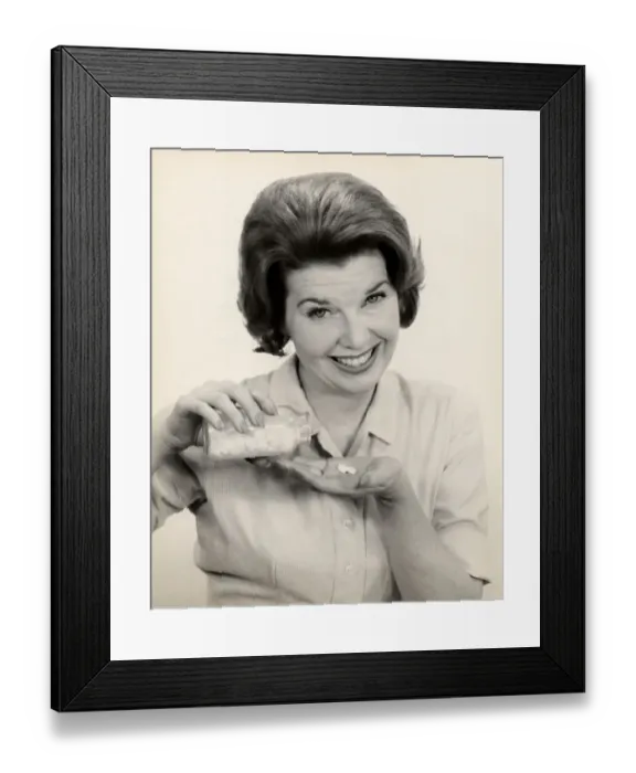 Framed Print : Woman with pills and pill bottle Framed Print : Woman with pills and pill bottle