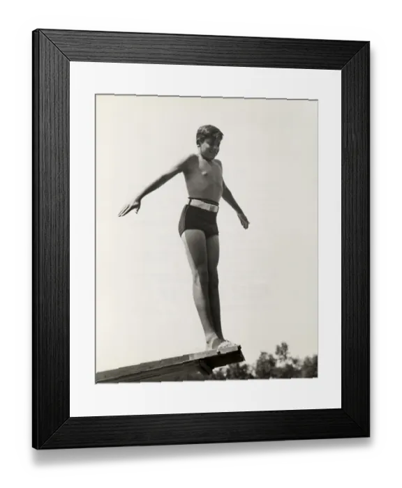 Framed Print : Young boy at end of diving board Framed Print : Young boy at end of diving board