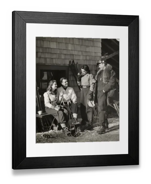 Framed Print : Two couples outside ski lodge Framed Print : Two couples outside ski lodge