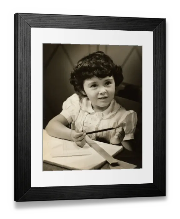 Framed Print : Young girl in school