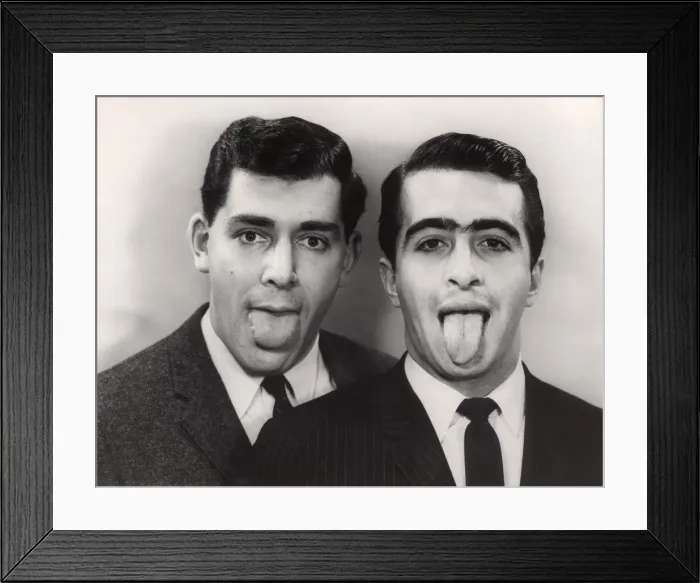 Framed Print : Close-up of two men with protruding tongues Framed Print : Close-up of two men with protruding tongues