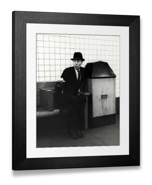 Framed Print : Executive with arm in public trash receptacle
